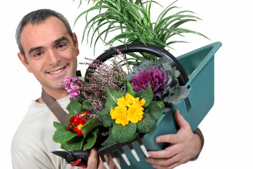 Expert gardeners working on garden maintenance services in Abbey Wood
